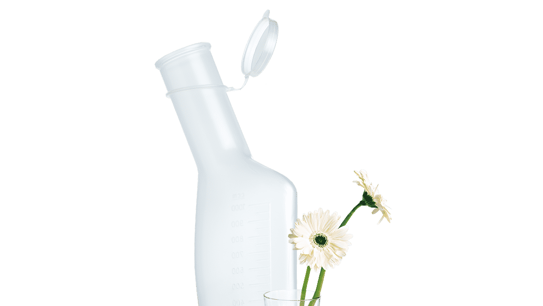 Urine bottle flowers in the glass Cleaned Urin bottle