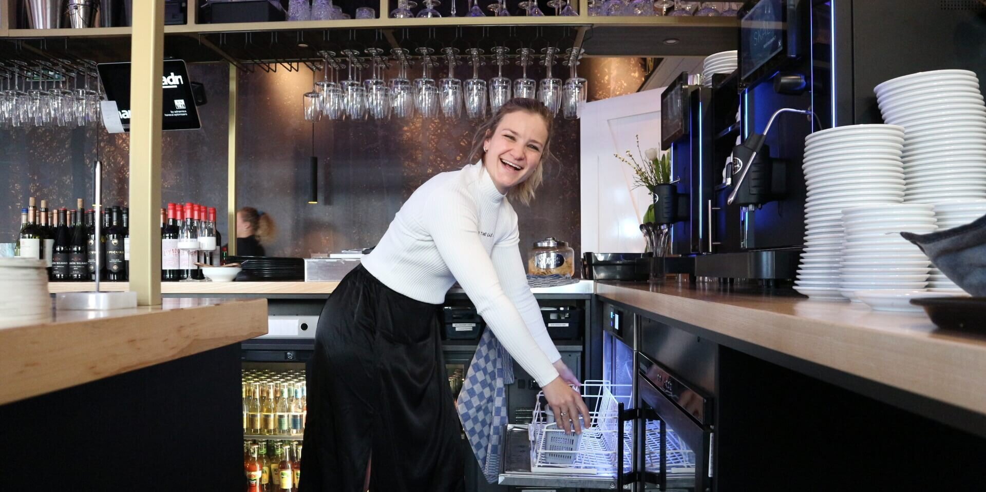 Manager Cindy Roeland behind the bar